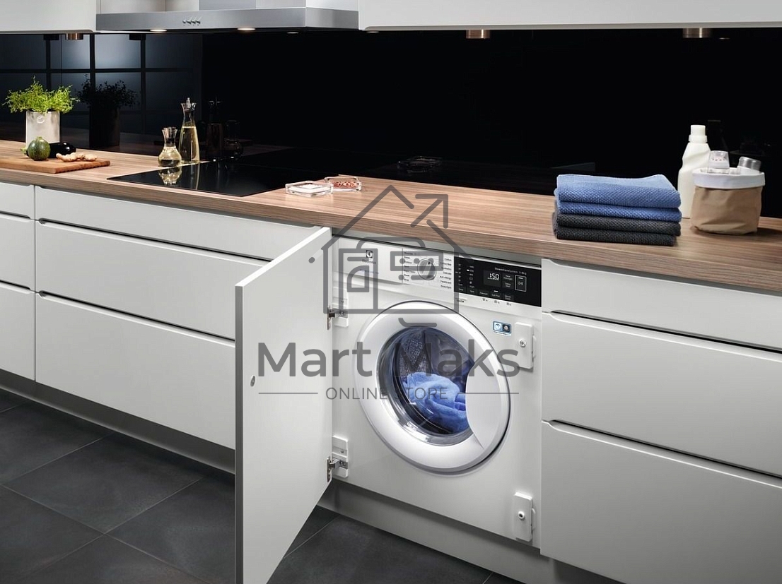 Встраиваемая стиральная машина Electrolux EWN7F447WI класс:B загрузка до 7кг